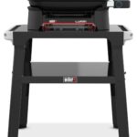 Weber Lumin Compact Kompakter Elektrogrill mit Standfuß, Bis zu 315 °C, mit Deckelthermometer, Porzellanemaillierte Gusseisenroste, 43 x 32 cm Grillfläche, Schwarz (1501653)