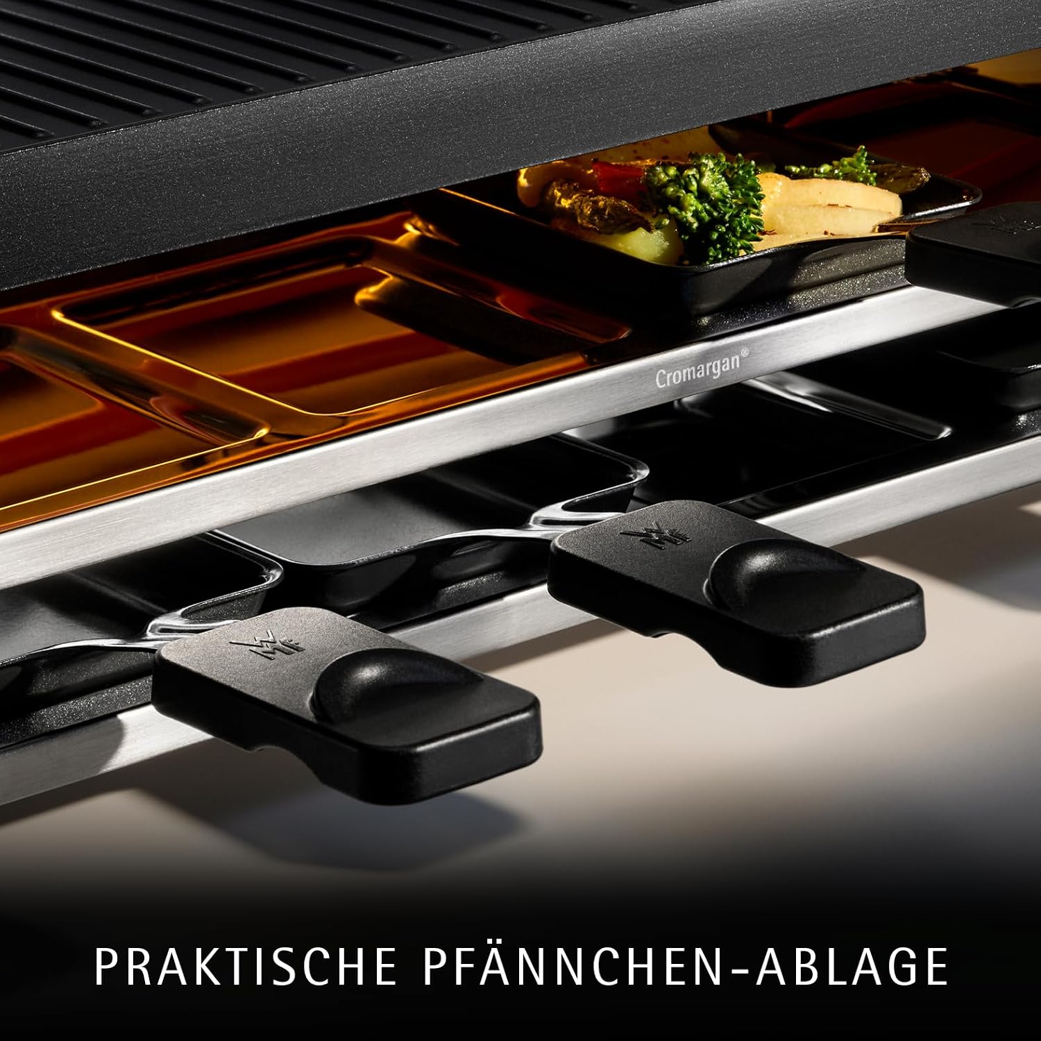 WMF Lono Selection Raclette Grill 8 Personen – Hochwertiger Cromargan Edelstahl, 1500W Leistung, keramikbeschichtete Grillplatte, 8 Pfännchen und Spatel, Temperaturregelung und Ablage 5 WMF Lono Selection Raclette Grill 8 Personen – Hochwertiger Cromargan Edelstahl, 1500W Leistung, keramikbeschichtete Grillplatte, 8 Pfännchen und Spatel, Temperaturregelung und Ablage – Bild 5