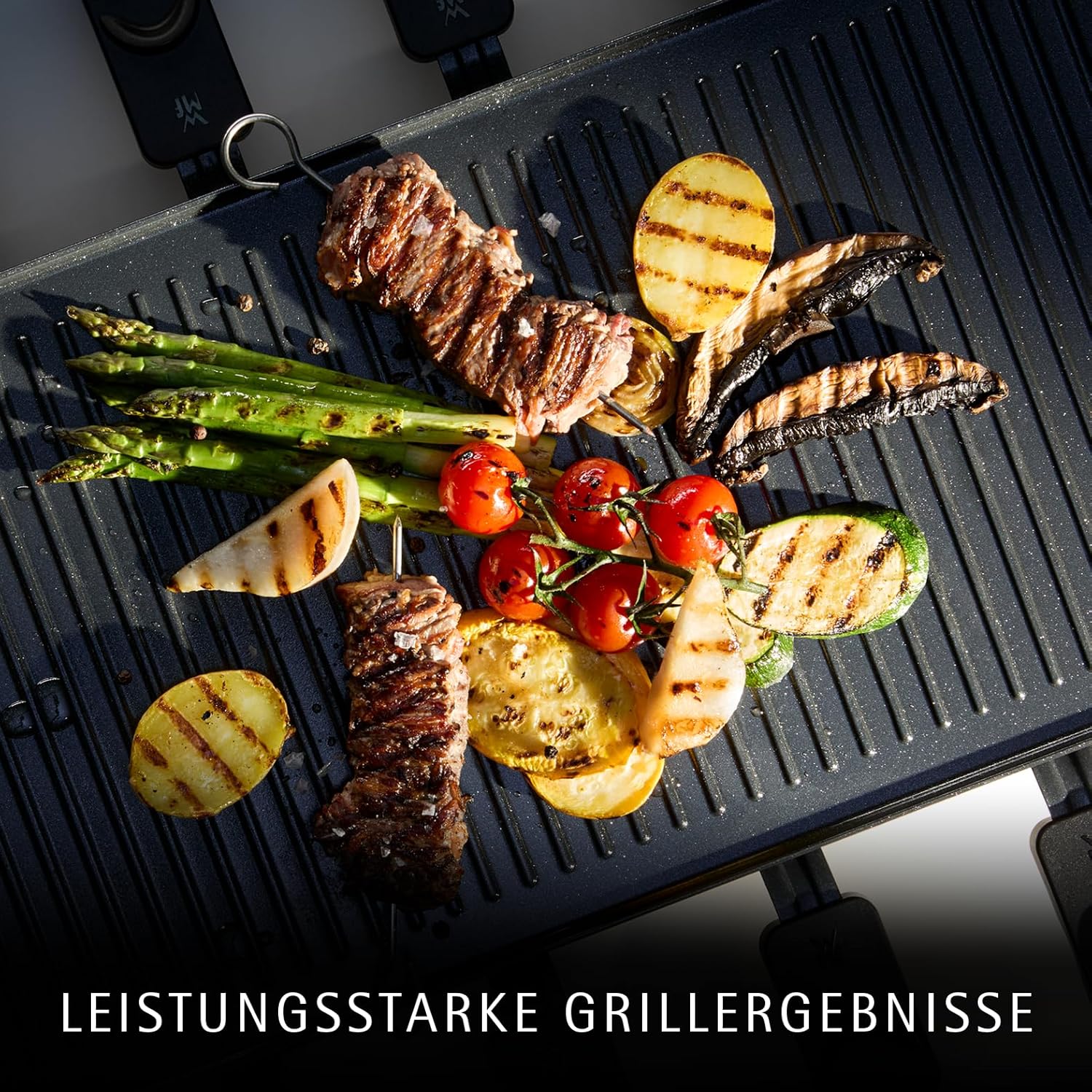 WMF Lono Selection Raclette Grill 8 Personen – Hochwertiger Cromargan Edelstahl, 1500W Leistung, keramikbeschichtete Grillplatte, 8 Pfännchen und Spatel, Temperaturregelung und Ablage 2 WMF Lono Selection Raclette Grill 8 Personen – Hochwertiger Cromargan Edelstahl, 1500W Leistung, keramikbeschichtete Grillplatte, 8 Pfännchen und Spatel, Temperaturregelung und Ablage – Bild 2